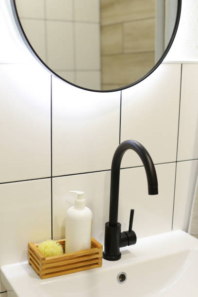 istock White Plastic dispenser bottles with body cream 1316899105