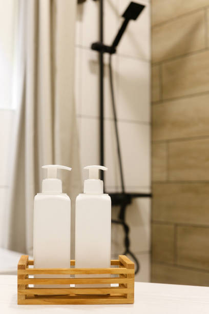 istock White Plastic dispenser bottles with body cream 1316899225