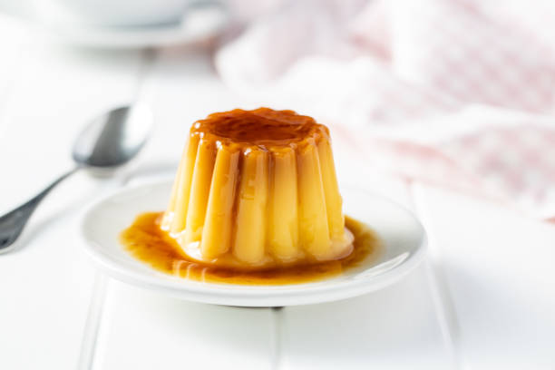 istock Sweet vanilla pudding. Sweet dessert with caramel topping. 1316900318
