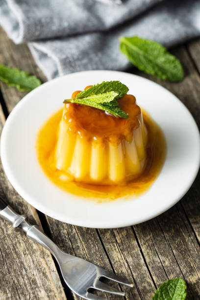 istock Sweet vanilla pudding. Sweet dessert with caramel topping. 1316900362