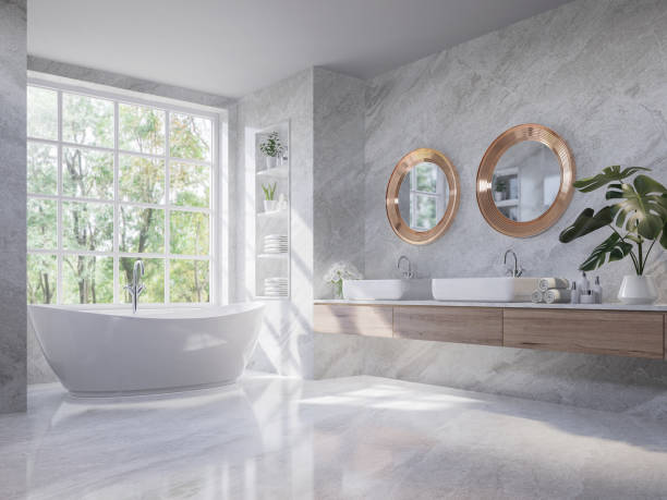 Luxury style light gray bathroom with nature view 3d render Luxury style light gray bathroom 3d render,There are marble floor and wall ,wooden sink counter and copper frame mirror,Rooms have large windows, overlook nature view,sunlight shining into the room. bathroom stock pictures, royalty-free photos & images