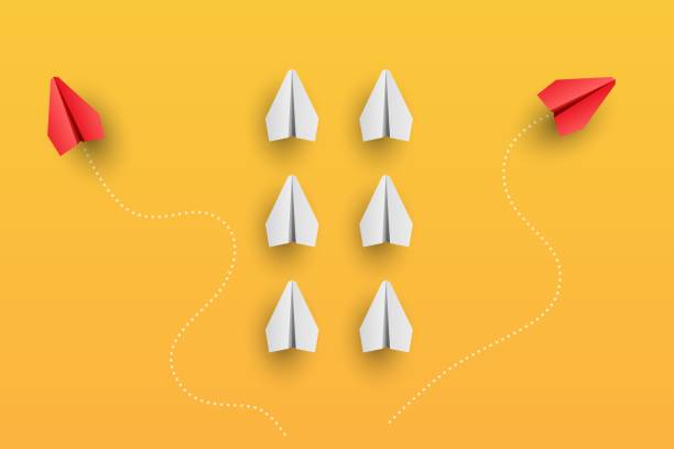 istock Individuality concept. Individual and unique leader red paper plane flies to the side. Vector 1316903613
