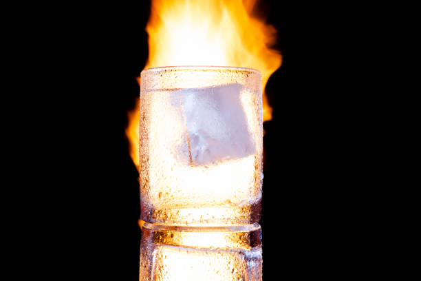 istock glass with ice and alcohol on a black background 1316905605