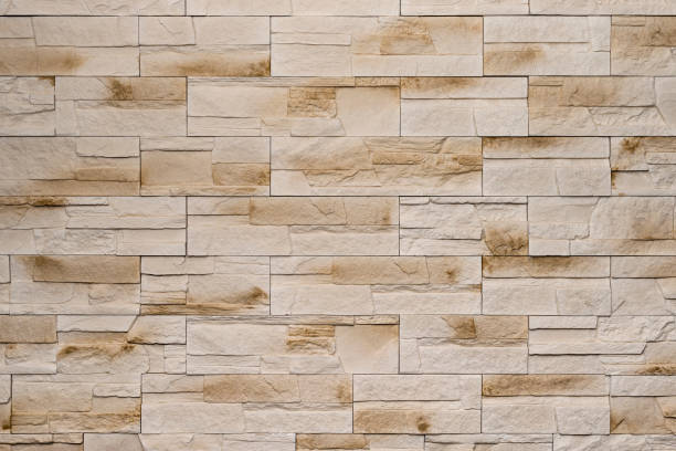 istock A Wall Made of Light Beige Decorative Stones. Wall Decor. Interior Home Design 1316905804