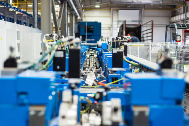 Roller forming machine. The interior of the plant producing a metal profile. Sheet metal processing.