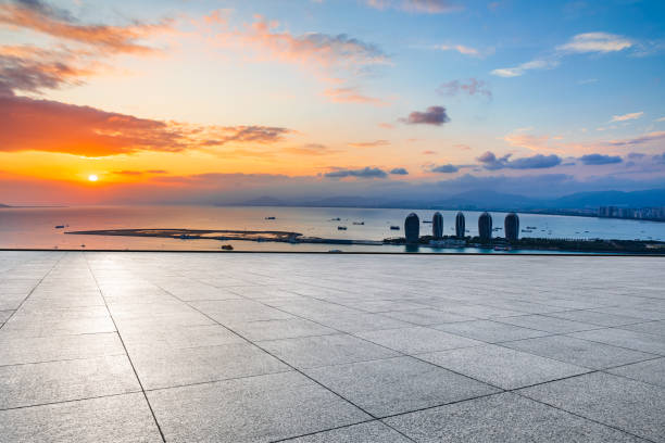 istock Empty floor and modern city skyline with sea. 1316913750