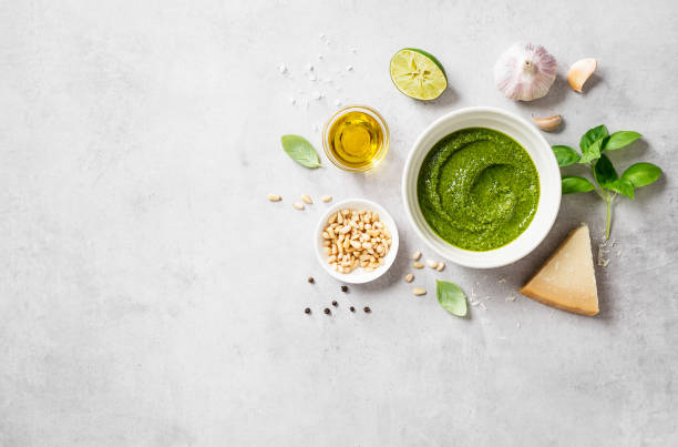 istock Fresh Italian pesto sauce with basil, pine nuts, parmesan cheese 1316913777