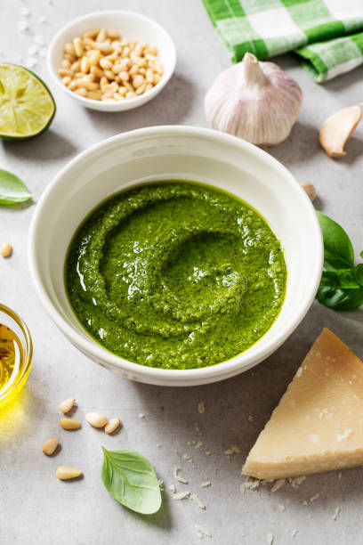 istock Fresh Italian pesto sauce with basil, pine nuts, parmesan cheese 1316913834