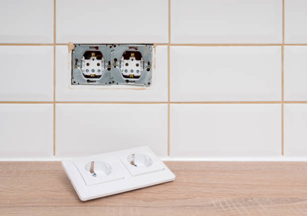 istock disassembled socket in the wall, ceramic tiles on the kitchen wall 1316913862