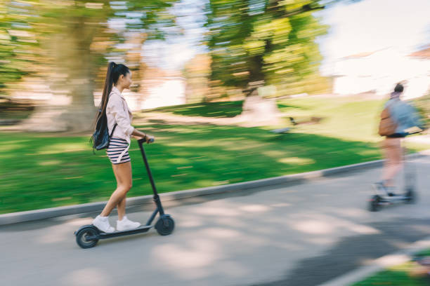 istock Tourists exploring the city on motor scooters 1316913954