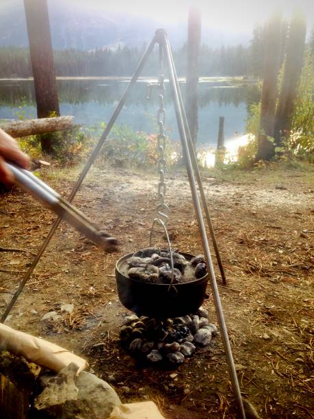 istock Campfire crock pot, at the lakeside. 1316918268