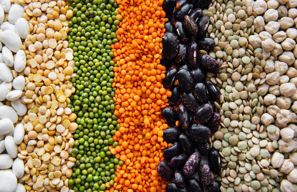 istock Food background with different legumes 1316920457