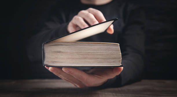 istock Caucasian man holding bible. Religion 1316921528