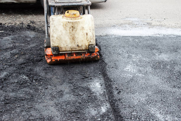 istock asphalt rammer. laying the road surface 1316922301