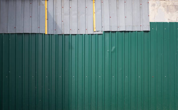 istock Corrugated metal fence, abstract industrial or construction background image 1316924258