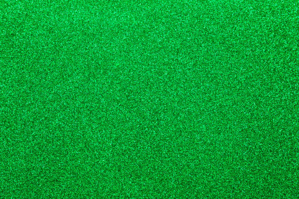istock green glitter glitter, place for text. Can be used as a background. 1316924344