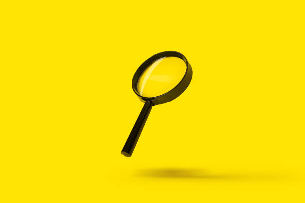 istock magnifying glass loupe magnifier search flies soars over yellow background 1316924423