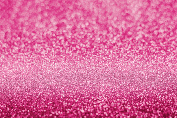 istock pink glitter glitter, close-up. Glowing background texture, place for text 1316924537