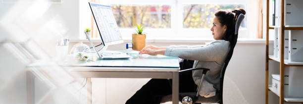 istock Bad Posture Sitting In Office Chair 1316930688