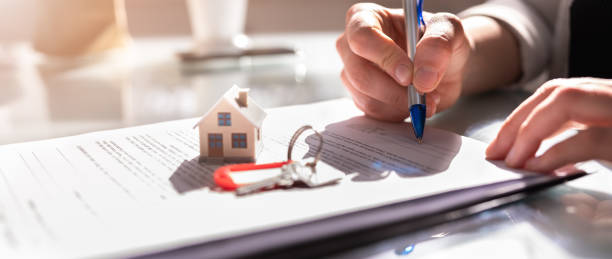 Signing House Rental Contract Document