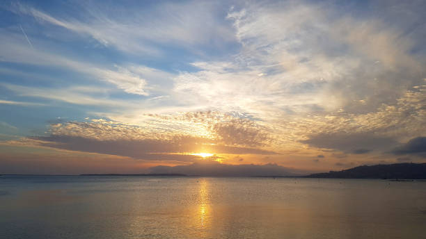 istock Sunset over the calm sea 1316932074