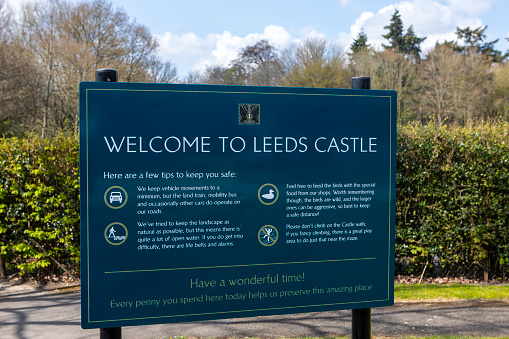 Kent, UK - May 1st 2021: A welcome sign at the historic Leeds Castle in Kent, UK.