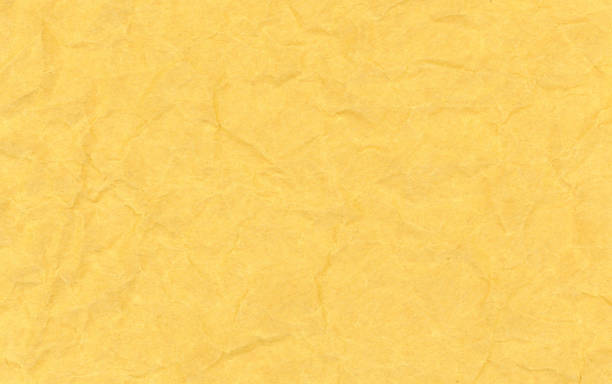 istock crumpled yellow vintage old blank paper texture 1316934996