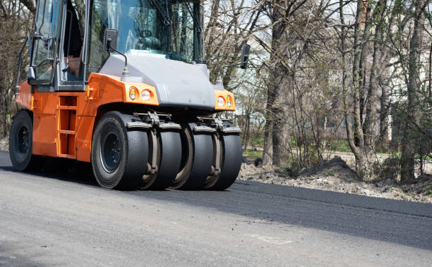 istock road repair with new asphalt and road rollers 1316935545