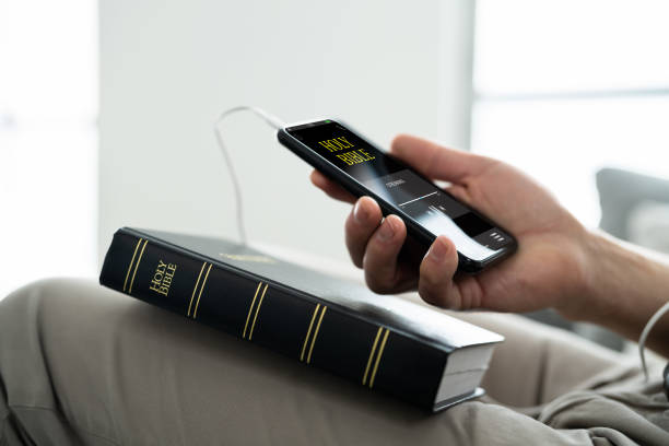 istock Preacher Listening Bible On Phone 1316937547
