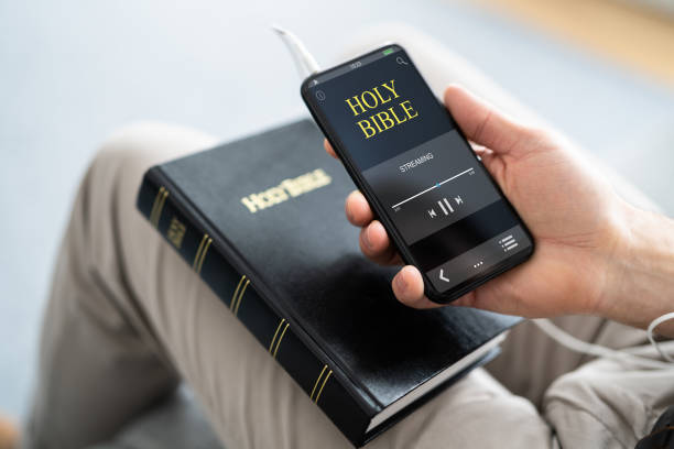 istock Preacher Listening Bible On Phone 1316937581