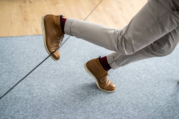 istock Wire Cord Trip Over And Fall. Feet Stumble 1316937684