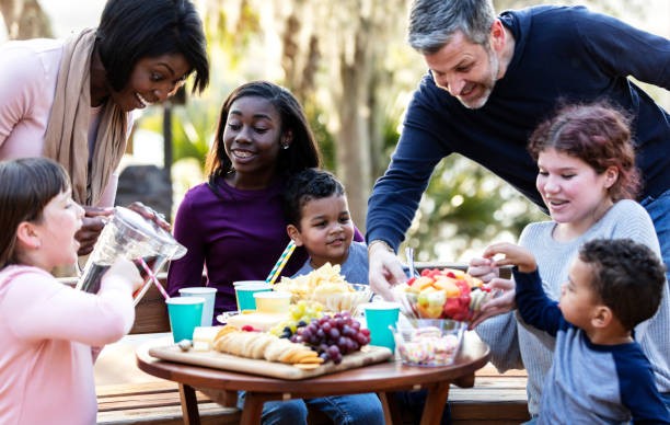 istock Blended family with five children having a picnic 1316938552