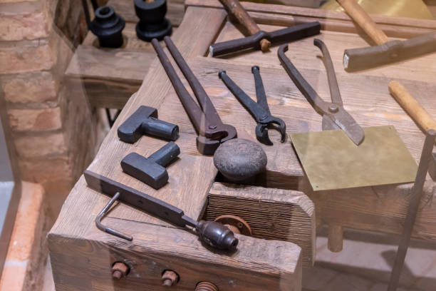 istock A workbench with a set of antique locksmith tools. 1316939903
