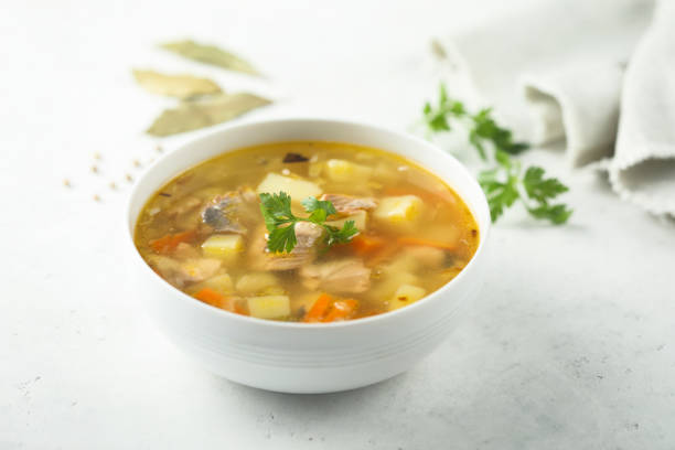 Salmon soup Traditional homemade salmon soup with vegetables fish in a bowl stock pictures, royalty-free photos & images