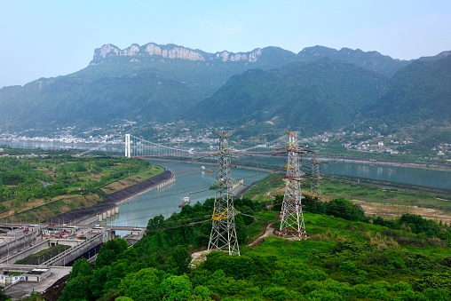 Yangtze River,Three Gorges,Xiling Gorge,\nYichang City,Hubei Province,China.\nThree Gorges Dam on the Yangtze River in China.\nThree Gorges Scenic Spot is a national 5A scenic spot, which is visited by many tourists every day throughout the year.