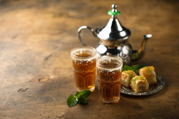 Moroccan mint tea Traditional Moroccan tea with fresh mint mint tea stock pictures, royalty-free photos & images