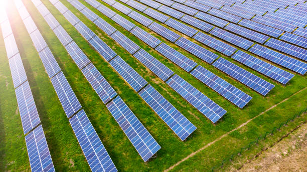 istock Aerial. Solar panels in a field. View above from drone. 1316946911