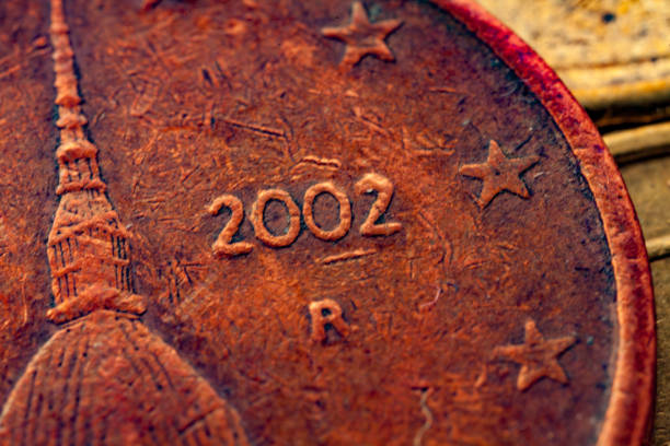 series of macro shots of euro coins. reverse of 2 cents. year of manufacture 2002. country italy - year 2002 imagens e fotografias de stock