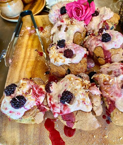 istock Fresh Baled Mulberry Muffins on Wood Board 1316948130