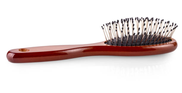 istock Wooden hairbrush on white background. 1316948403