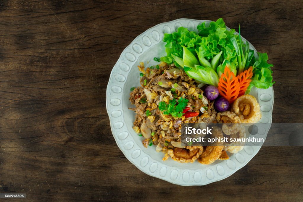Jackfruit Curry Paste Stir Fried with Crispy Garlic Served Crispy Pork Jackfruit Curry Paste Stir Fried with Crispy Garlic Served Crispy Pork and Fresh Vegetable  Northen Local Thai Food Lanna Style topview Omelet Stock Photo