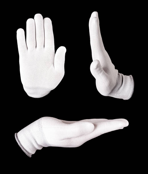 istock hold hands in white glove on black background. 1316951275