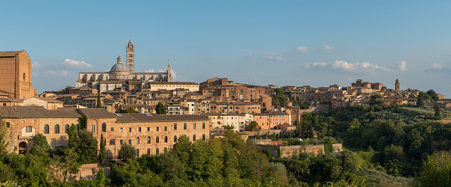 Panoramic cityscape of the historical town of Siena. Central Tuscany, Italy