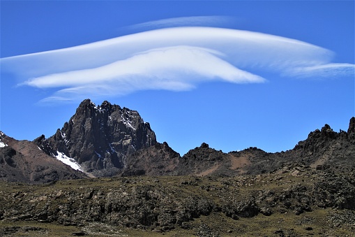 Mount Kenya peak with clouds