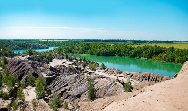 istock Landscape blue lakes with sand pits 1316954382