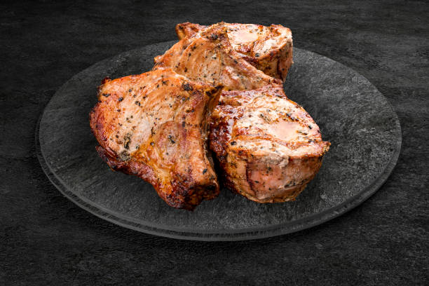 istock A selection of grilled gourmet meats on a rustic stone board. Pork kebab 1316959425