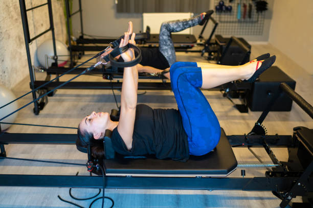 istock Two women in pilates workshop 1316959484
