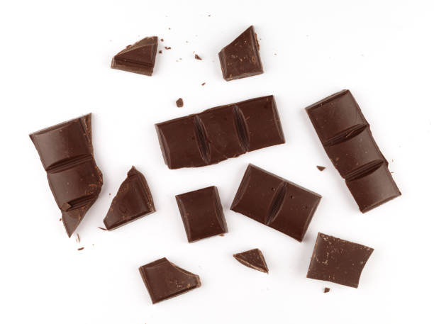 istock Pieces of dark chocolate on a white background isolate 1316960317