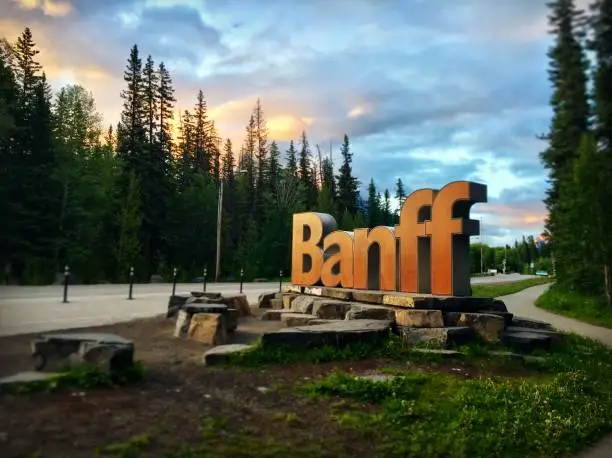 Banff Town Sign at town entranceway during sunrise, Banff, Alberta, Canada.