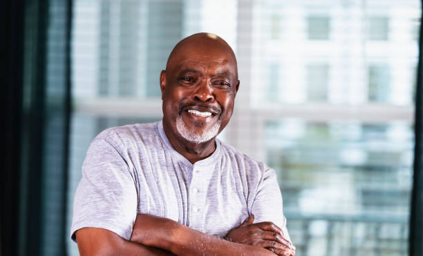 istock Senior African-American man at home by window 1316963901